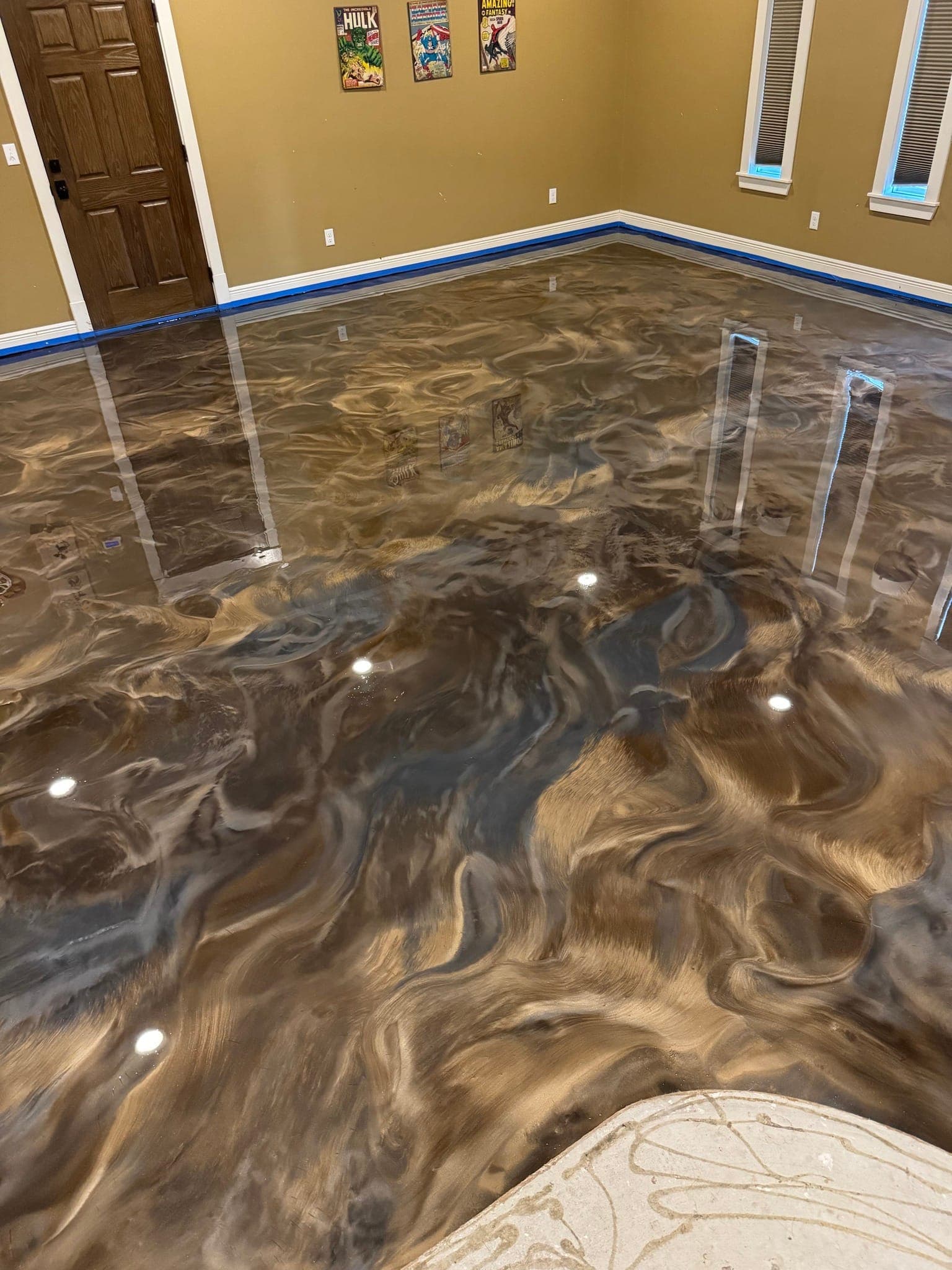 Interior floor finished in a warm brown and cream metallic swirl